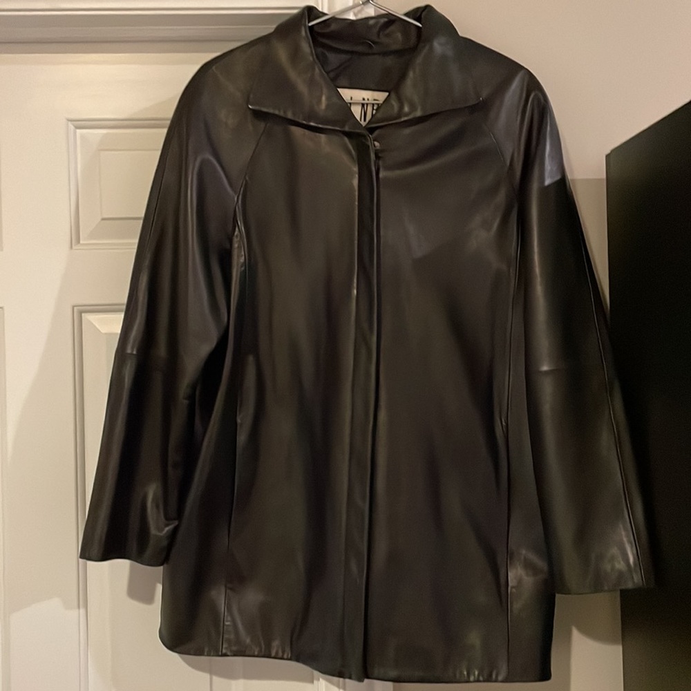 Super soft leather jacket, quilted, hits mid thigh. Size large. Gently worn.